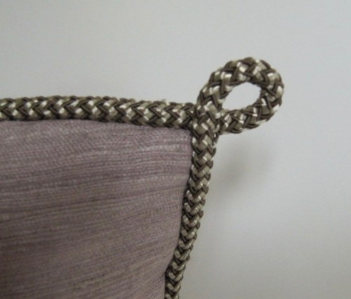 Hand applied rope/cord with a loop.